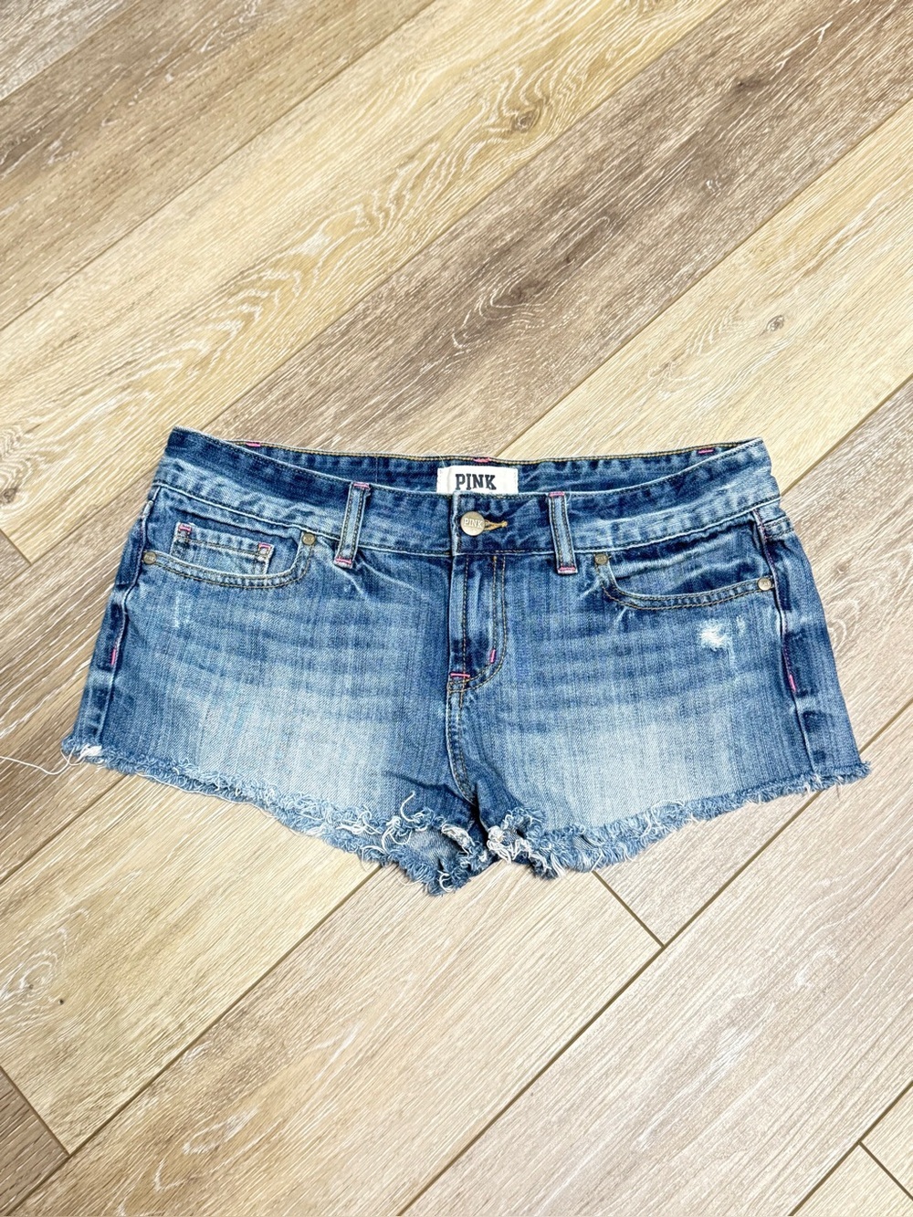 PINK Victoria's Secret Low Rise Distressed Denim Cutoff Shorts Frayed Hem Size 4